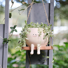 HUNTHAWK resin planter that enhances succulent setups with playful art