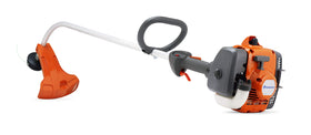 Husqvarna 122C curved shaft trimmer for precise edging around obstacles.