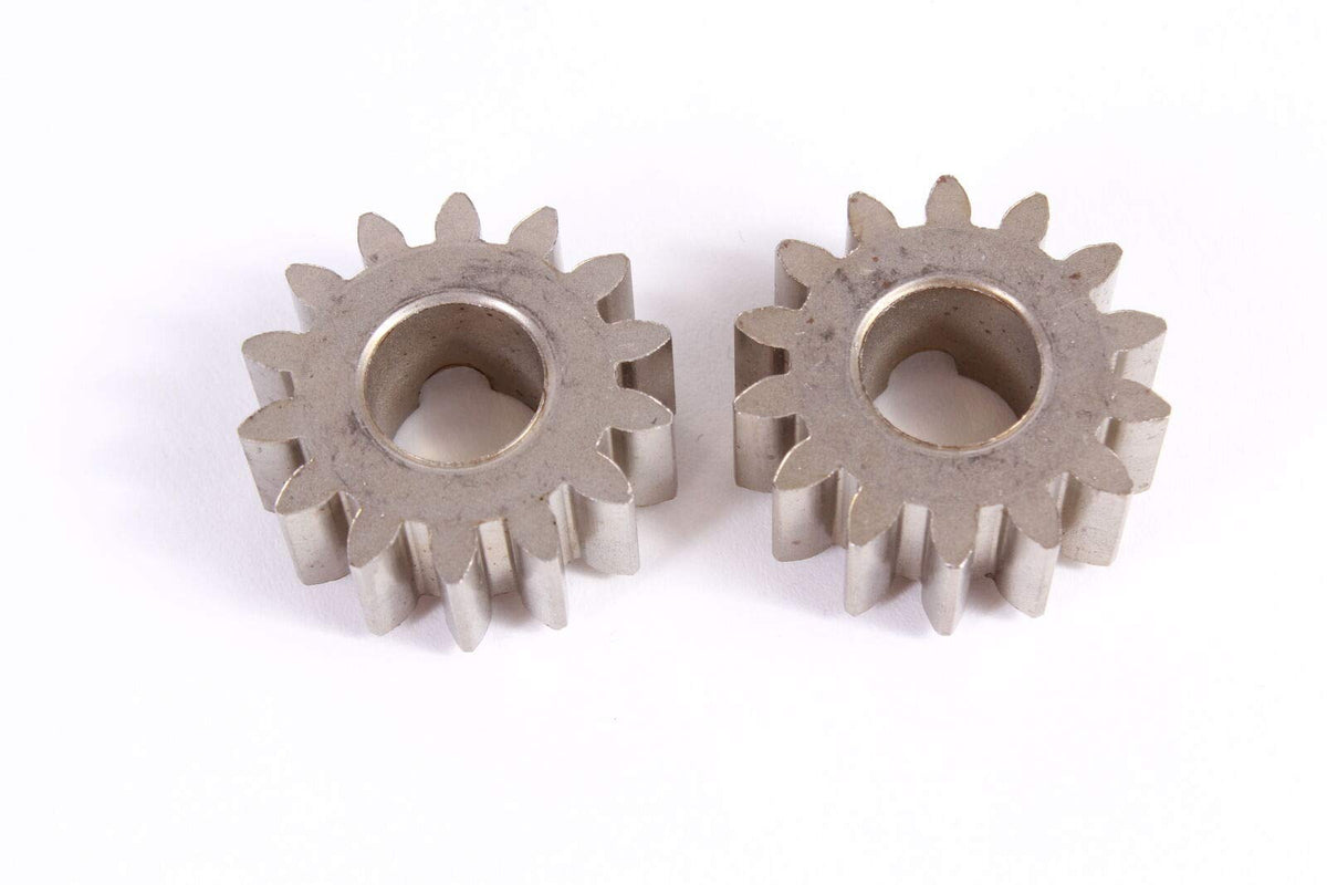 Close-up of genuine Husqvarna 14T pinion gear showing precise teeth.