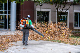 Husqvarna 580BTS in action on commercial leaf cleanup