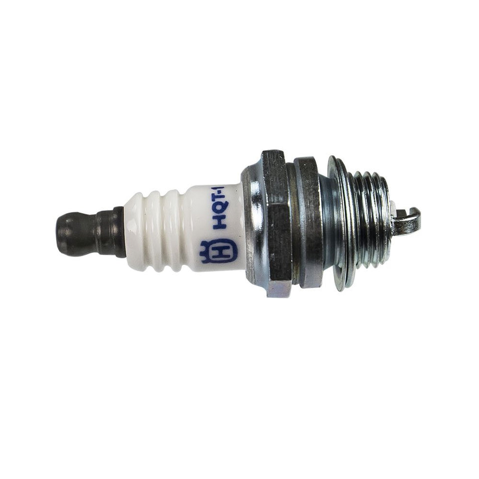 Husqvarna HQT-1 HH spark plug BPMR7A close-up shows precise ignition fit.