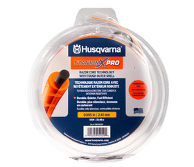Husqvarna Titanium X-Pro 100ft orange spool trimmer line designed for durable edging.