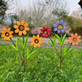 HUTHDAK metal flowers outdoor stakes add vibrant color to your garden.