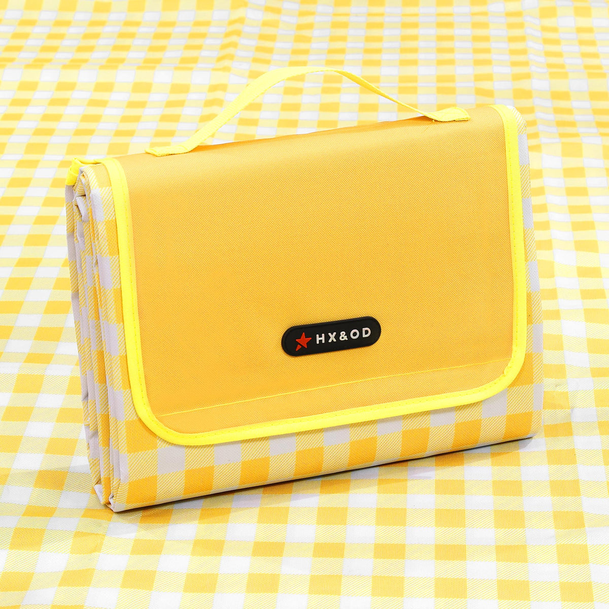 HX&OD picnic blanket fully spread for a family outing with ample space