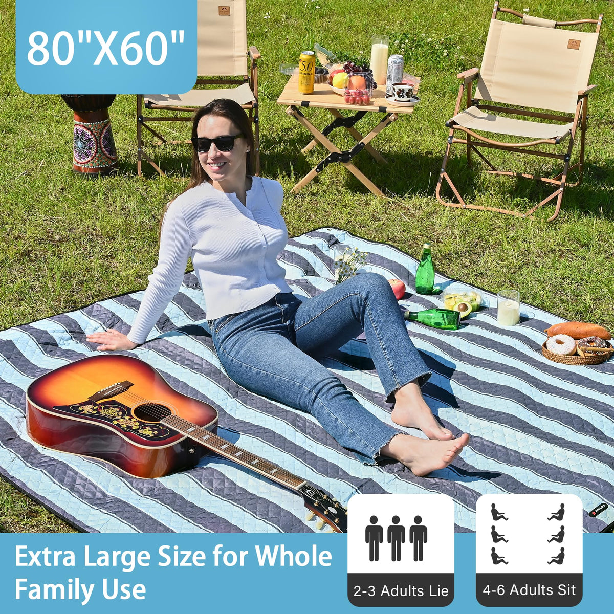 HX&OD Picnic Blanket folded compact, easy to carry with strap.