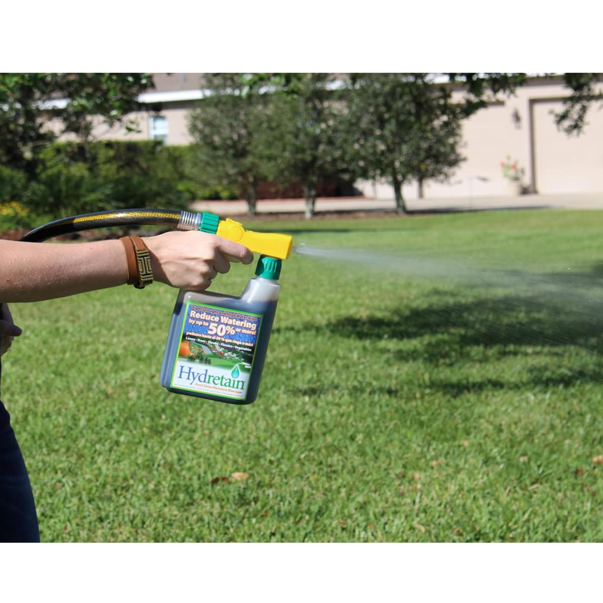 Lush green lawn benefiting from Hydretain moisture management.
