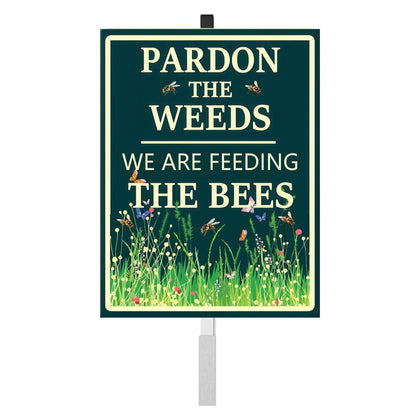 ICOMON Pardon The Weeds sign with stakes promotes pollinator habitats in yards