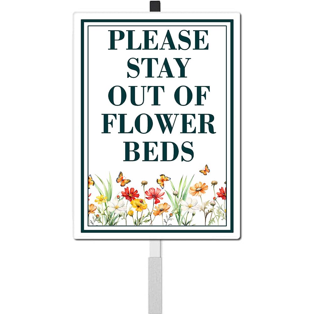 ICOMON pollinator habitat yard sign on stakes in a sunny garden for outdoor education