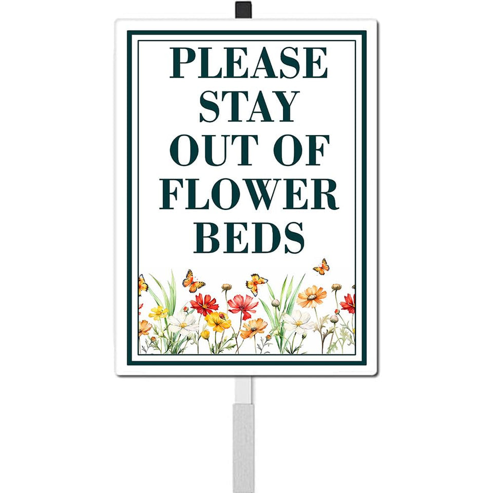 ICOMON pollinator habitat yard sign on stakes in a sunny garden for outdoor education