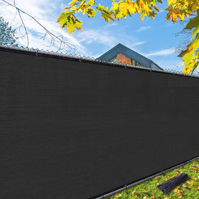 iCover privacy screen attached to a fence blocks street view while allowing breeze