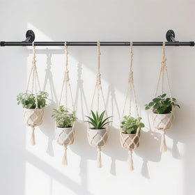 Ihomepark 44-5 inch plant hanging rod in black displays vertical greenery for space-saving indoor gardening.