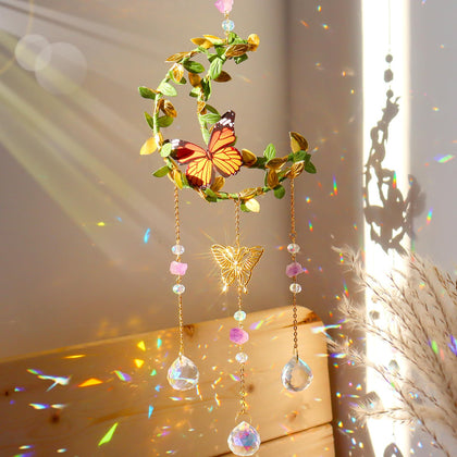 ilclviz Hanging Crystal Suncatcher by Moon casts rainbow light near a sunny window