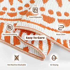 Ileading outdoor rug, easy to clean, orange geometric pattern for messy outdoor areas.