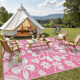 Ileading waterproof patio rug in pink floral pattern ideal for decks and pools.
