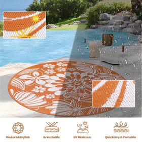Ileading portable foldable rug includes stakes for stable setup.
