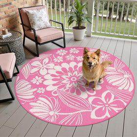 Ileading reversible rug showcases two floral sides for quick style changes.