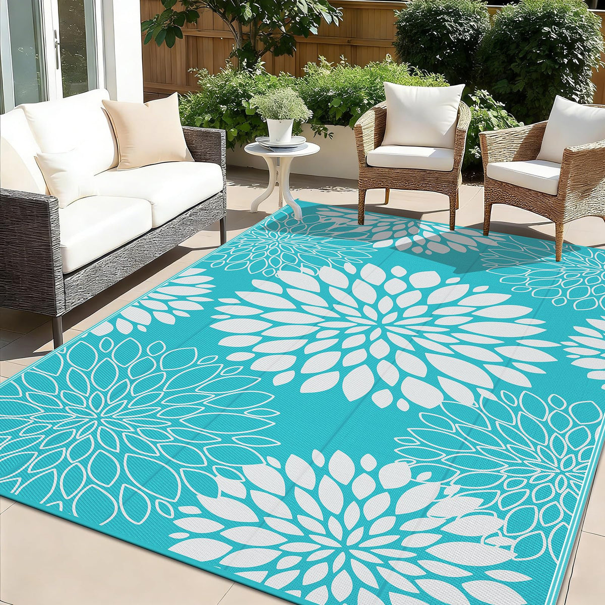 Ileading waterproof outdoor rug in teal floral front view enhances patio decor.
