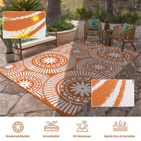 Ileading waterproof outdoor rug in orange geometric pattern ready for pool or beach use.