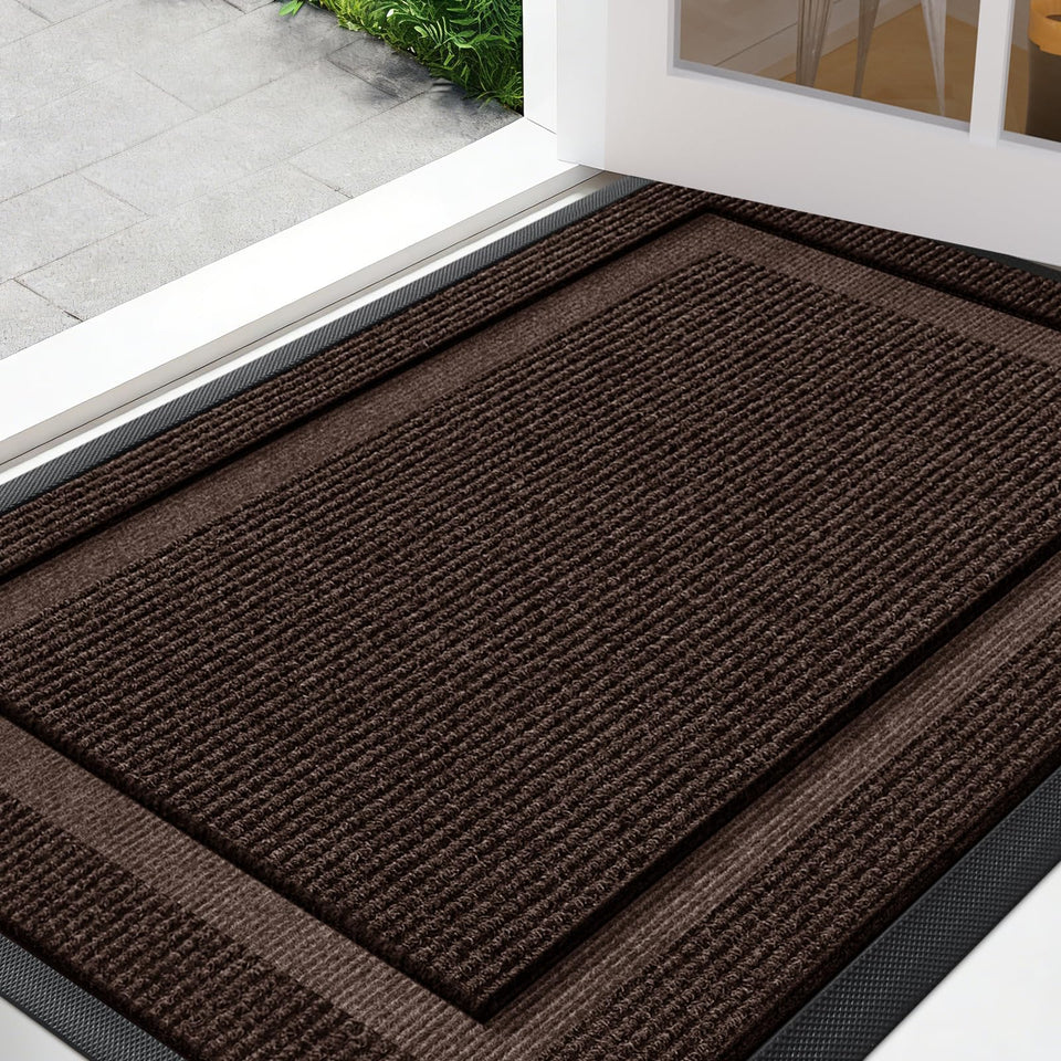 IM HOME front door mat with non-slip backing traps dirt and water at entry.