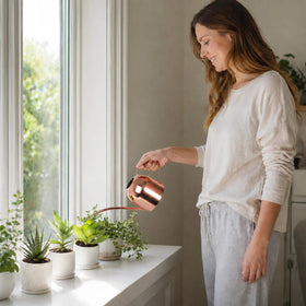 IMEEA watering can in rose gold finish adds style for plant care