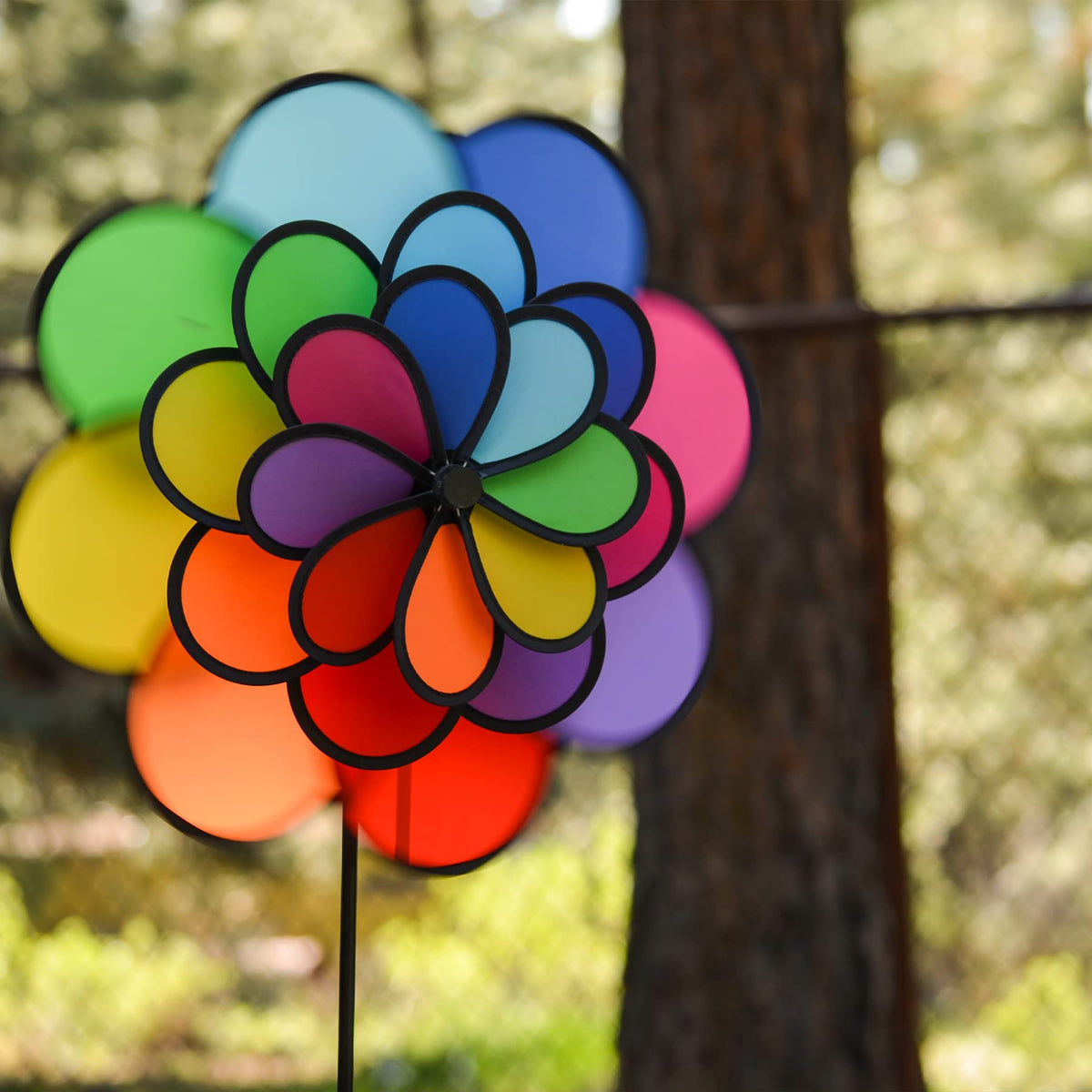 In the Breeze 24-petal wheel arrangement creates eye-catching color and movement in your yard.