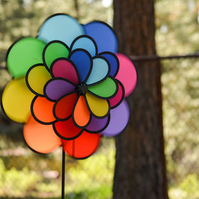 In the Breeze 24-petal wheel arrangement creates eye-catching color and movement in your yard.