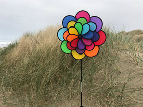 In the Breeze Triple Wheel Flower spinner shows independent rotation for lively motion.