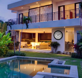 Infinity Instruments wide outdoor clock on exterior wall for visibility