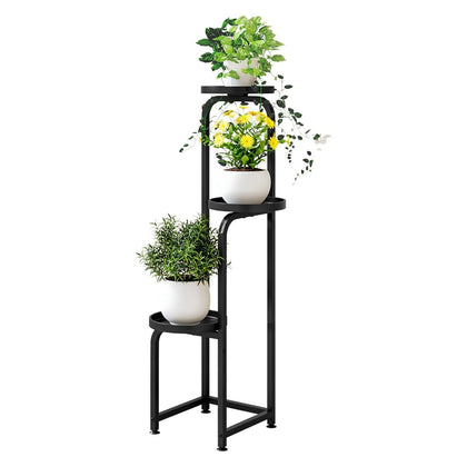 INGIORDAR 3-tier plant shelf displays multiple pots, ideal for organizing a small living space.