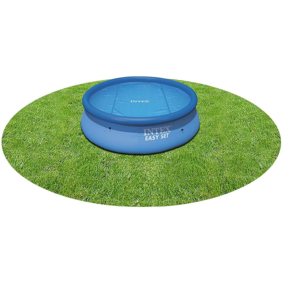 Intex 10ft solar pool cover on water helps warm water and extend the swimming season