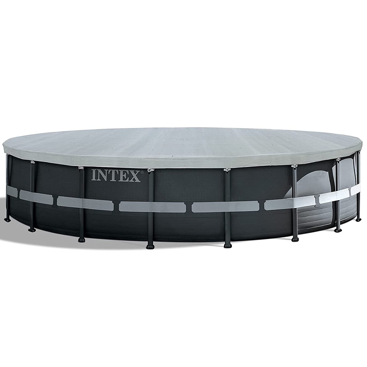 Intex Deluxe pool cover shielding pool from leaves and debris during off-season.