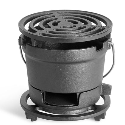 IRONMAX 2-in-1 hibachi grill outdoors with draft door for precise heat control.
