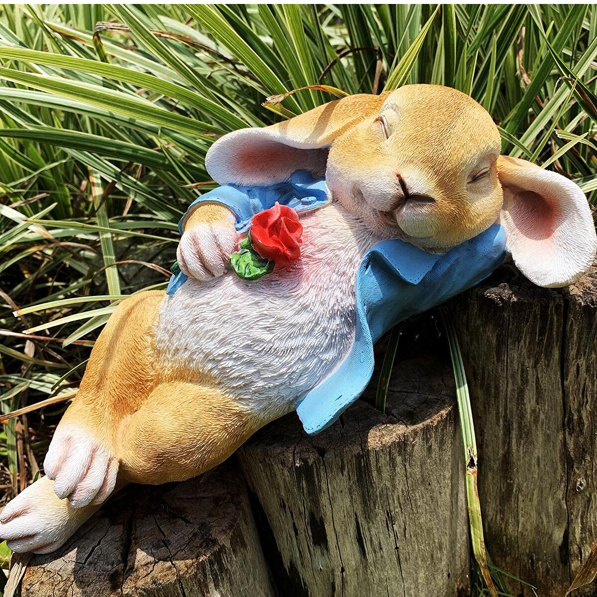 iRonrain rabbit lying posture statue enhances intimate backyard ambiance.
