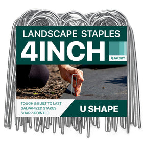 Jaciry U-shaped 4-inch stakes securing landscape fabric in a garden.