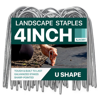 Jaciry U-shaped 4-inch stakes securing landscape fabric in a garden.
