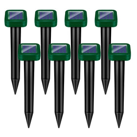 Jahy2Tech solar mole repellent stake in ground protects lawn from pests.