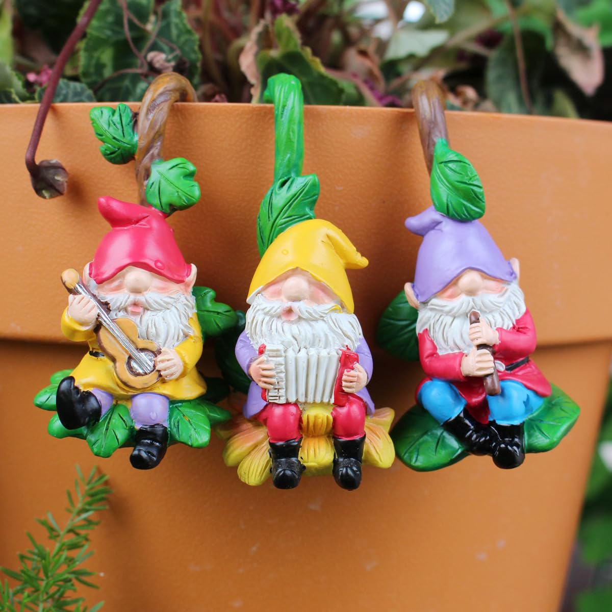 JARPSIRY gnome with branch decorates garden fences and walls