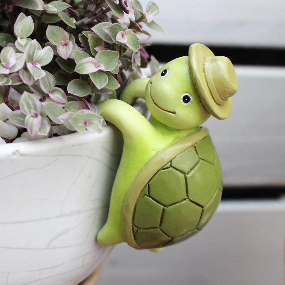 JARPSIRY cute cartoon tortoise pot hugger on a planter edge adds whimsy