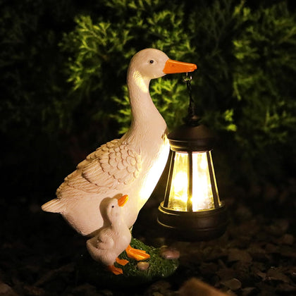 JARPSIRY garden duck statue with solar lantern adds warm ambient glow for outdoor spaces