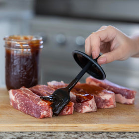 Jarware silicone basting brush lid is dishwasher-safe for easy cleanup.