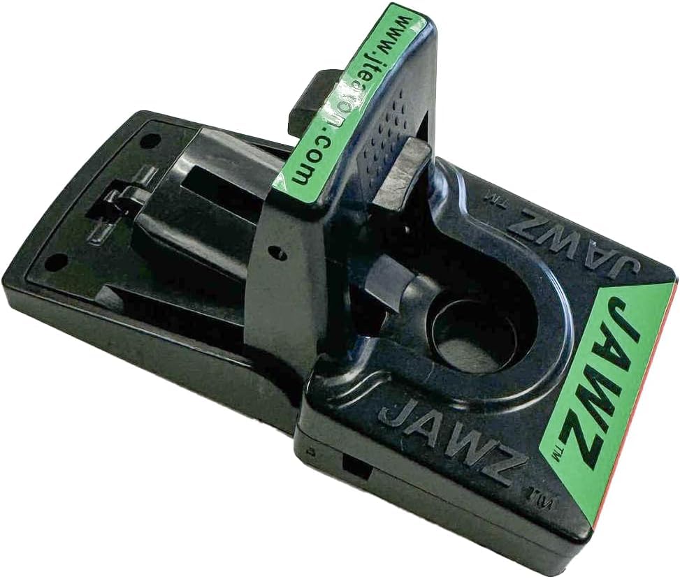 JAWZTM plastic mouse trap being set by hand for quick setup