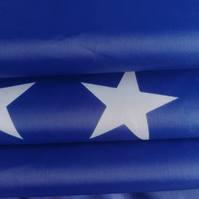 Jayus flag close-up reveals 3-ply Oxford cloth and layered construction for strength