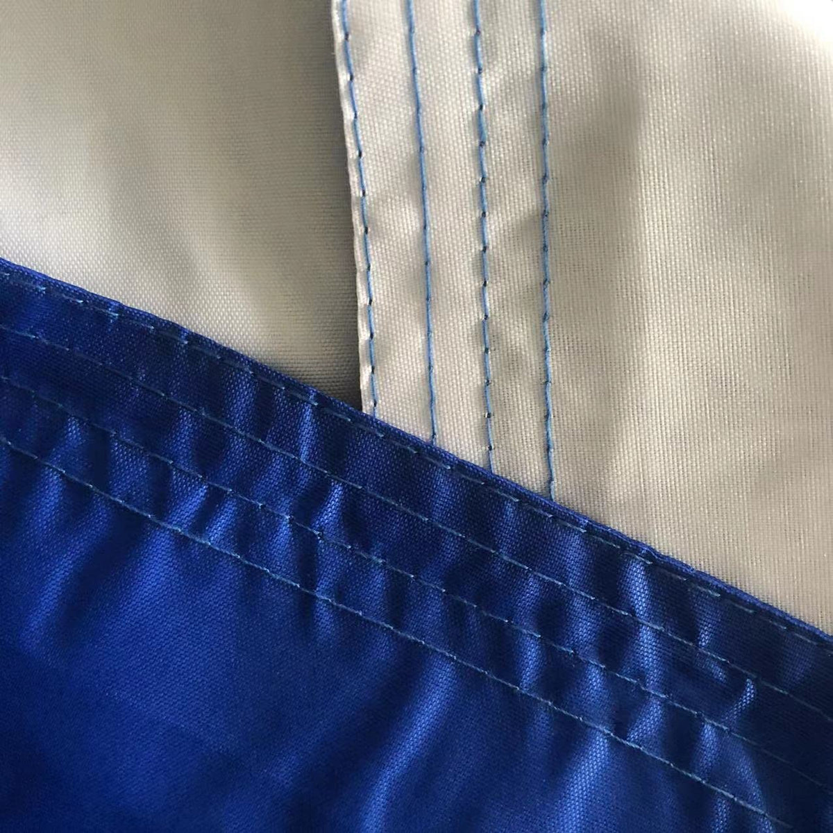 Jayus flag shows neat 4-row stitching along the edges