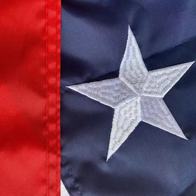 Jayus embroidered stars flag showing dense stitching and vivid colors.