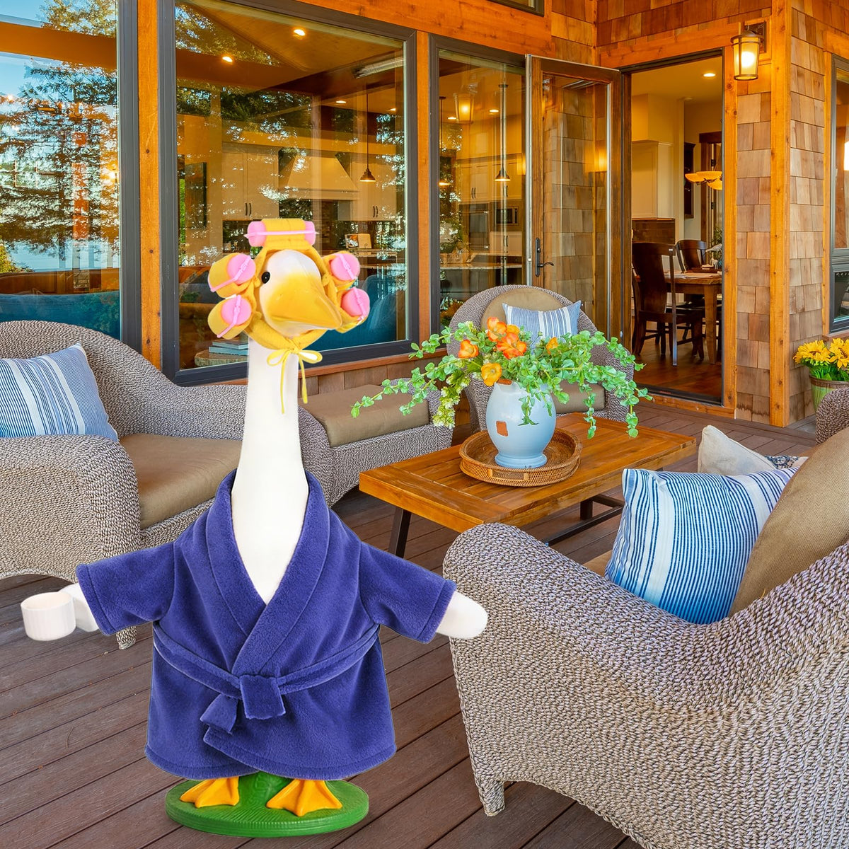 JcHrmers dark purple goose costume on a porch statue boosts curb appeal