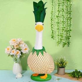JcHrmers pineapple-themed goose attire brightens lawn and patio space