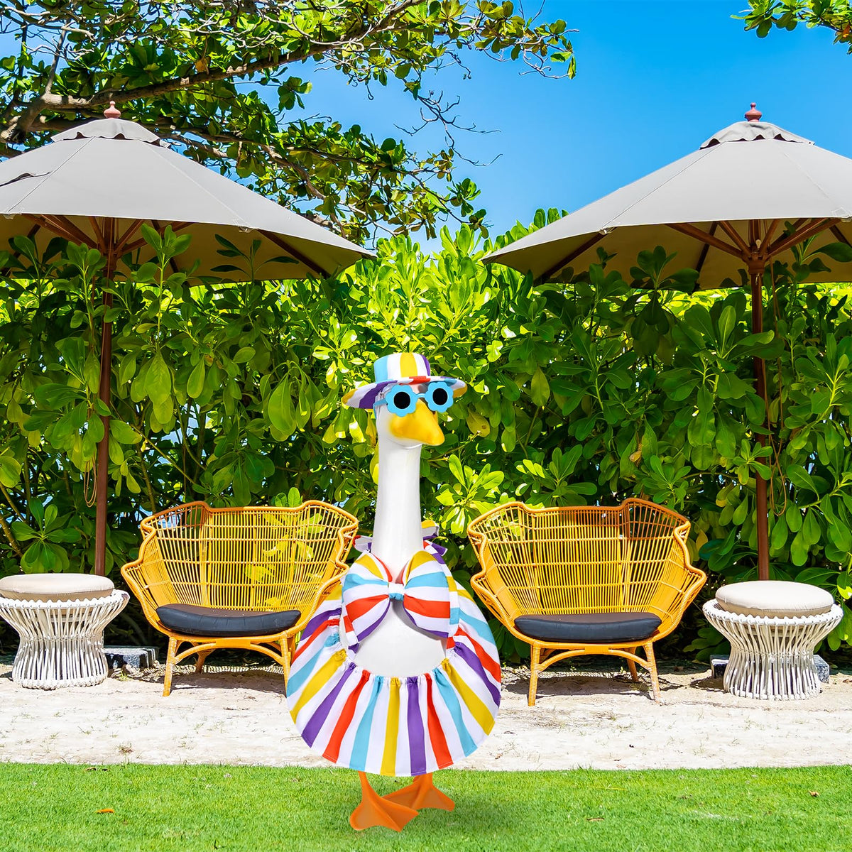 JcHrmers summer garden display boosts curb appeal with whimsical geese.