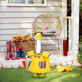JcHrmers yard display featuring goose outfit enhances outdoor charm
