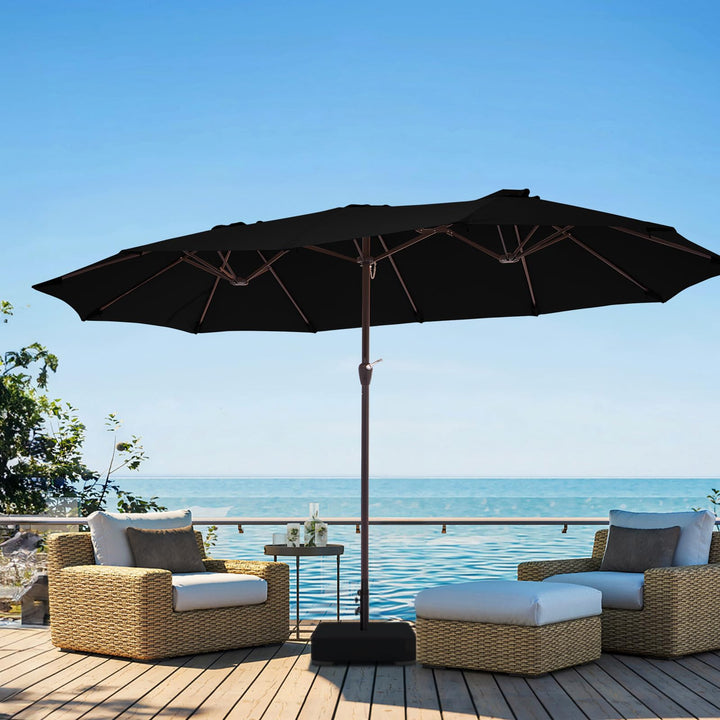 JEAREY 15ft patio umbrella base close-up shows stable poolside shade