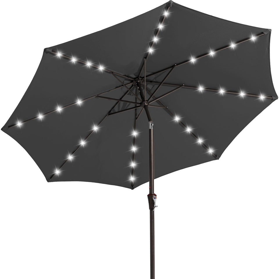 JEAREY 9ft umbrella with solar lights shading an evening outdoor setup